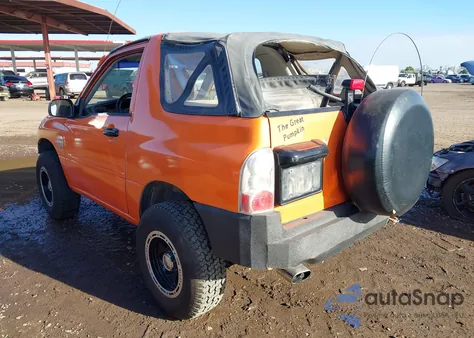 2000 Chevrolet Tracker из США, поврежденный, VIN 2CNBJ1863Y6920157